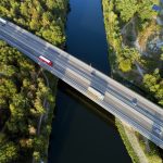 road on a bridge over a forest