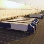 trucks parked on a warehouse