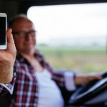 truck driver with a smartphone