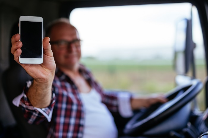 truck driver with a smartphone