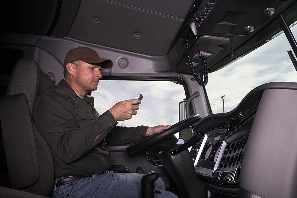 truck driver in his cabin